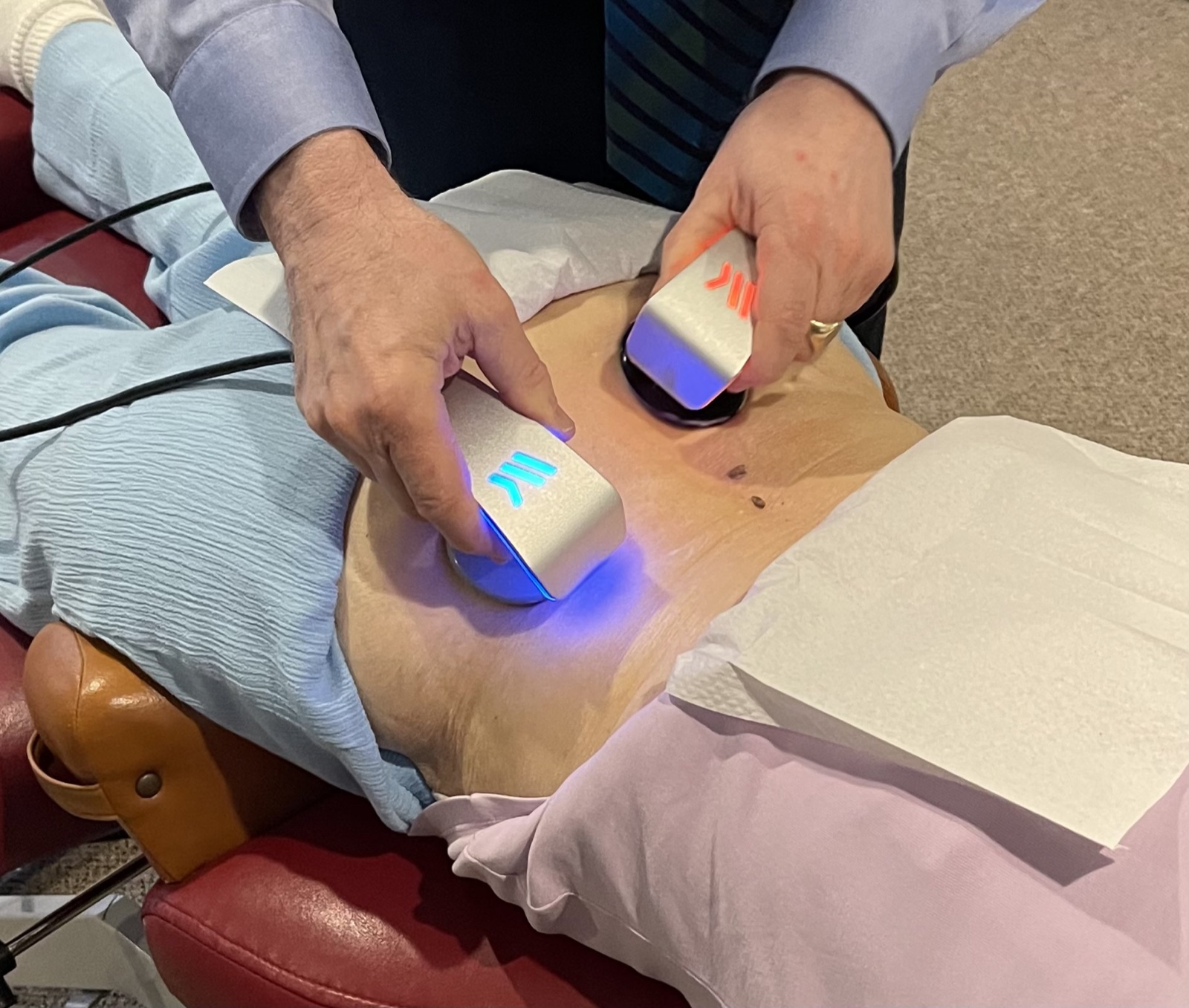 Winback TECAR therapy being applied to a patient's lower back at DeFabio Chiropractic in Berkeley Heights, NJ